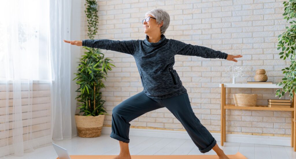 Older woman doing yoga